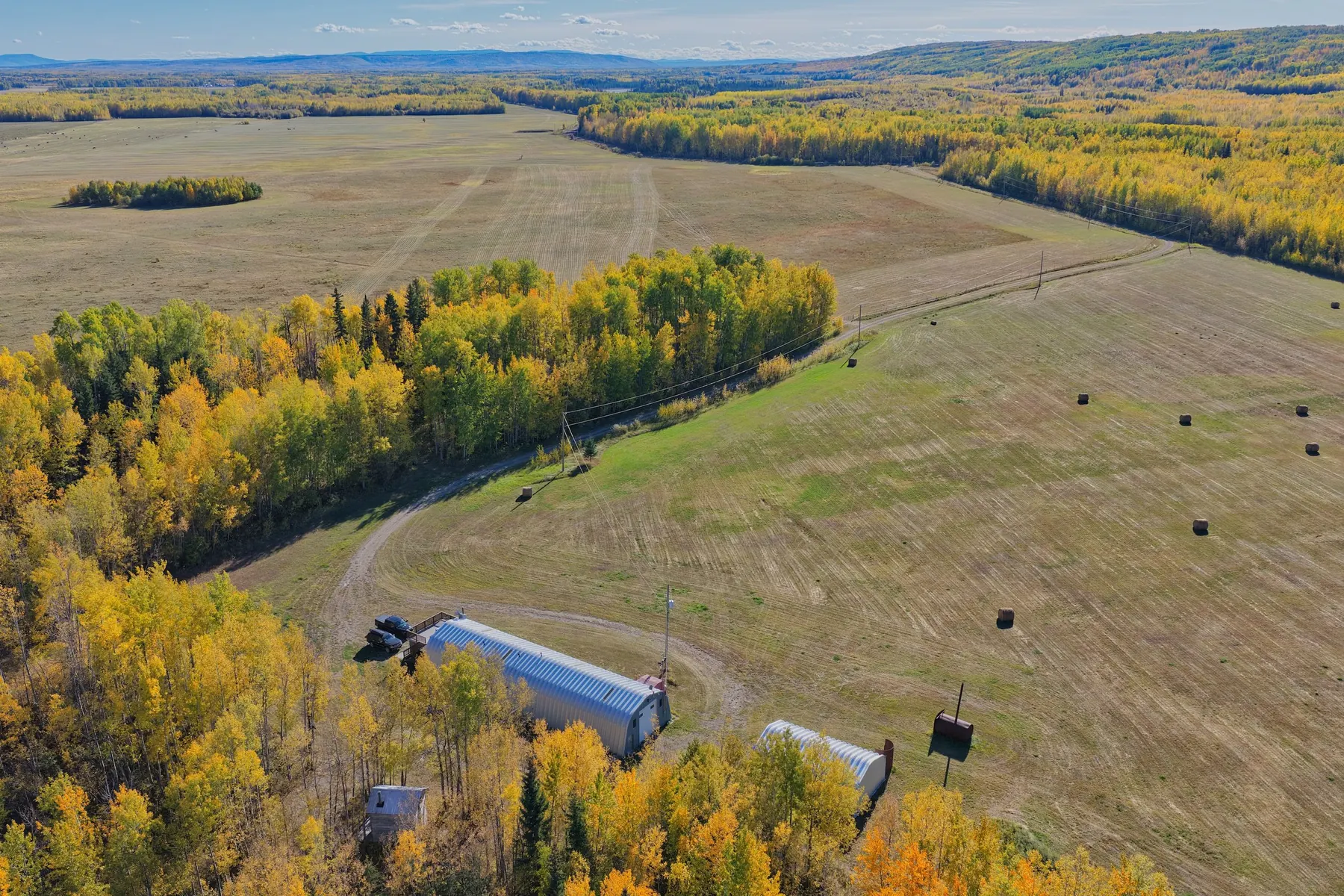 Aerial view of South Peace farmland in late fall, heading into winter
